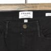 Schwarze FRAME Skinny Jeans mit lässigem, ausgefranstem Saum. Ein klassisches Secondhand Designerstück, perfekt für vielseitige Alltagslooks.